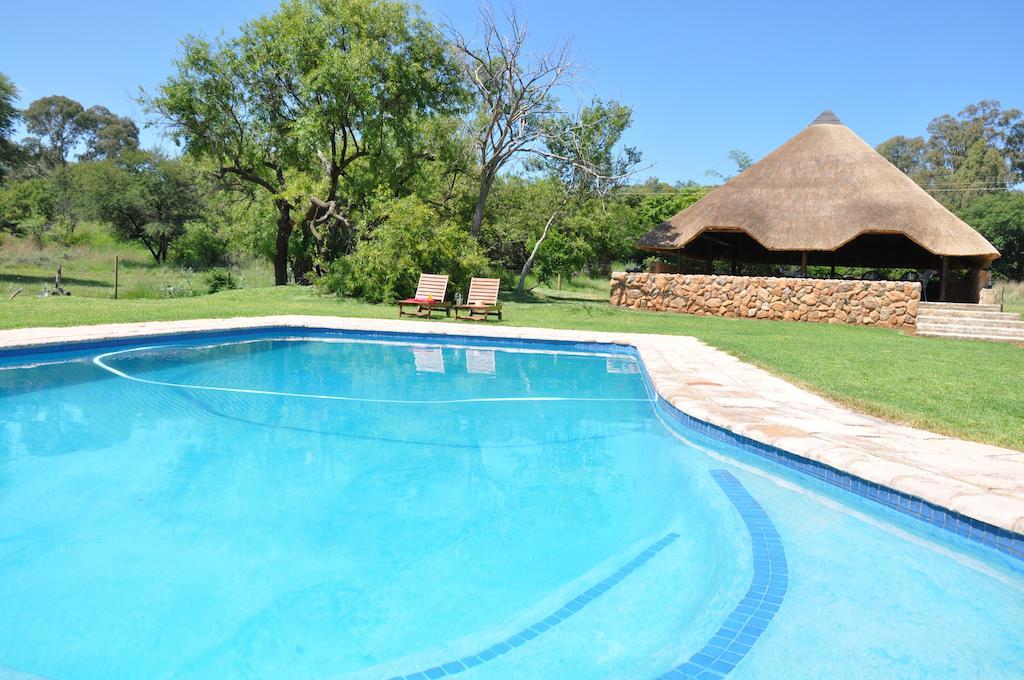 Intaba Thulile Hotel Maanhaarrand Buitenkant foto